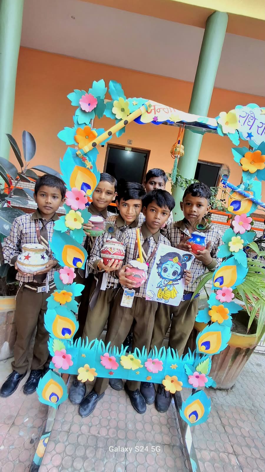 Students at the Janmashtami photo booth