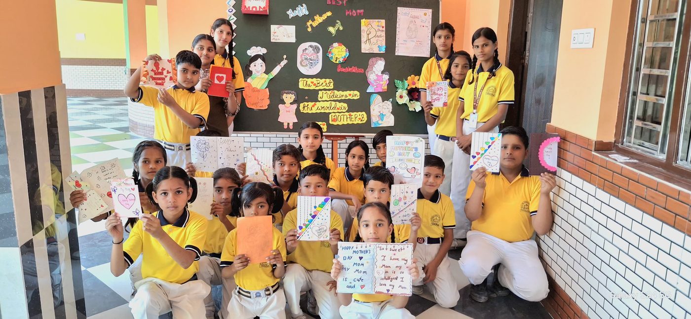 Students with handmade Mother's Day cards