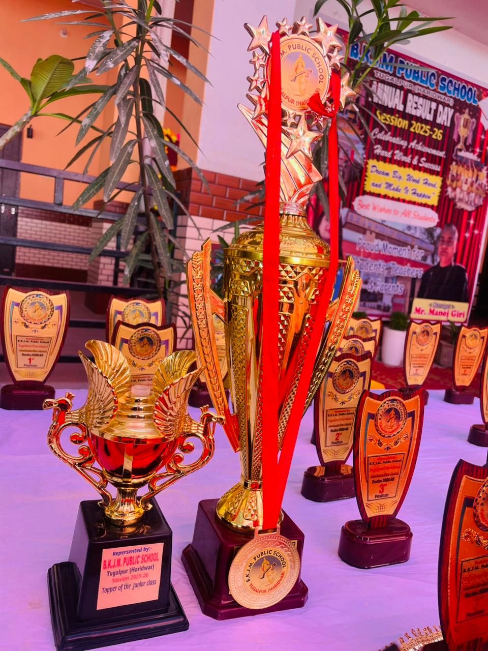 Trophies and awards at BKJM Public School's Annual Result Day