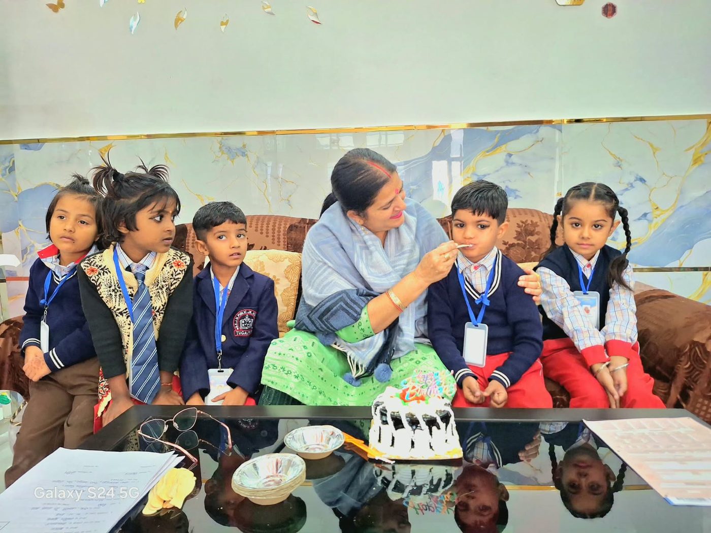 A teacher celebrating a student's birthday